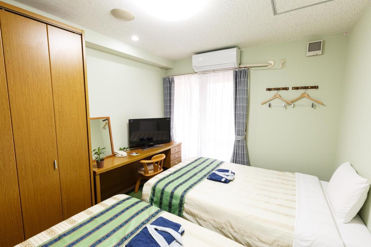 Hotel Peace Land Kume Naha Bagian luar foto