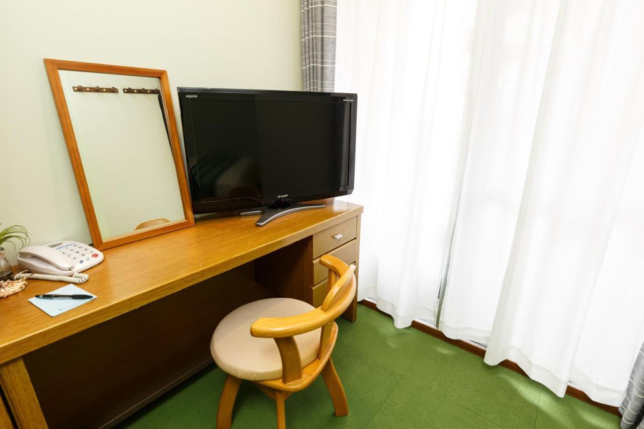 Hotel Peace Land Kume Naha Bagian luar foto