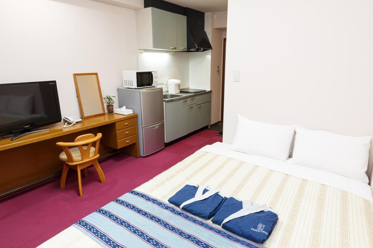 Hotel Peace Land Kume Naha Bagian luar foto