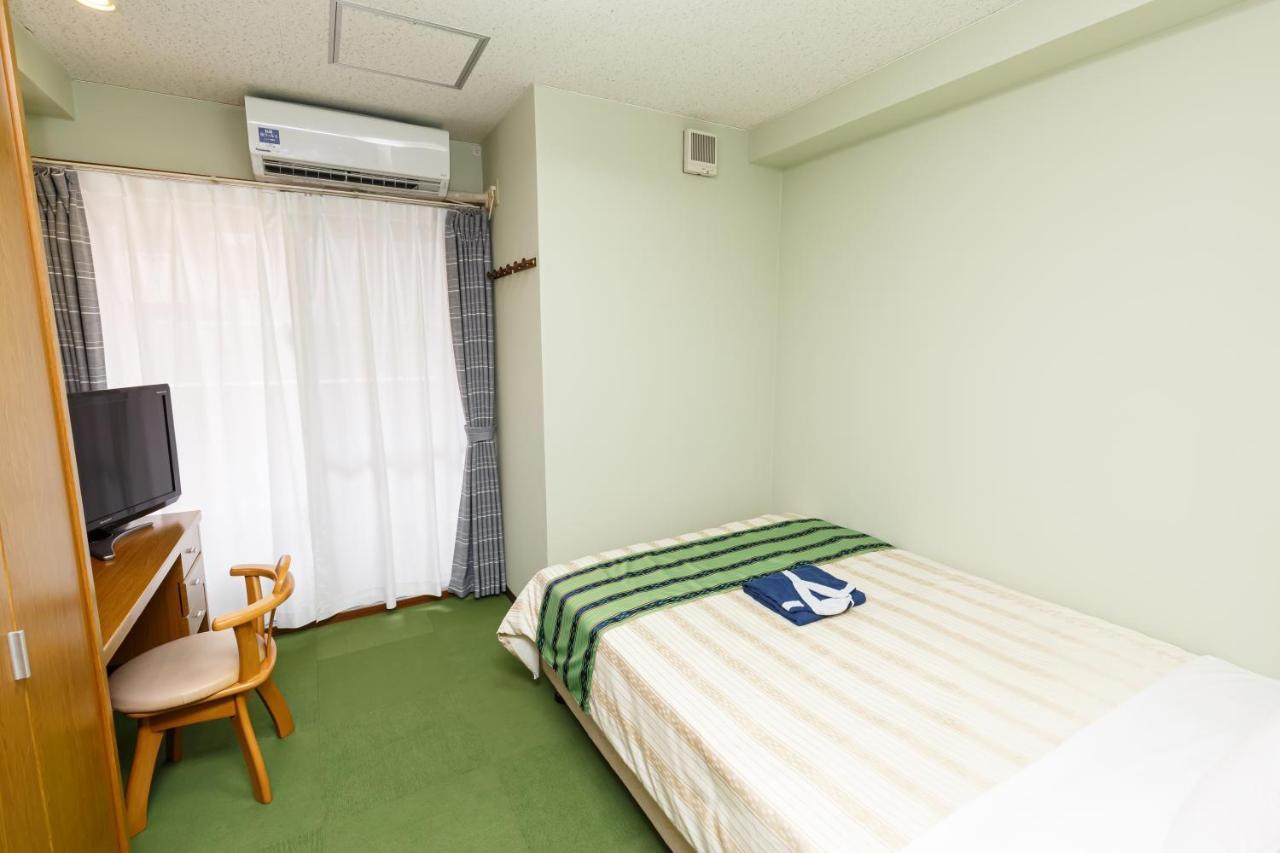 Hotel Peace Land Kume Naha Bagian luar foto