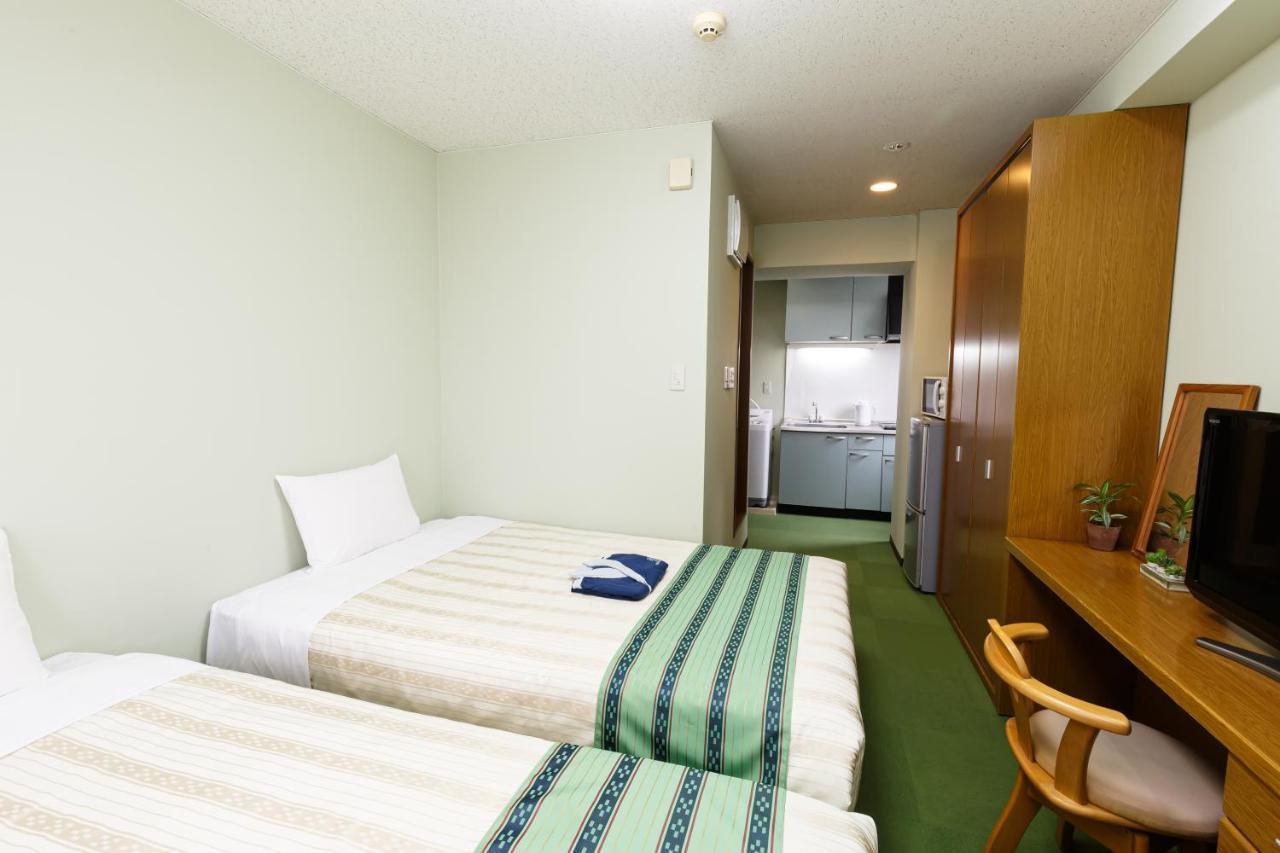 Hotel Peace Land Kume Naha Bagian luar foto
