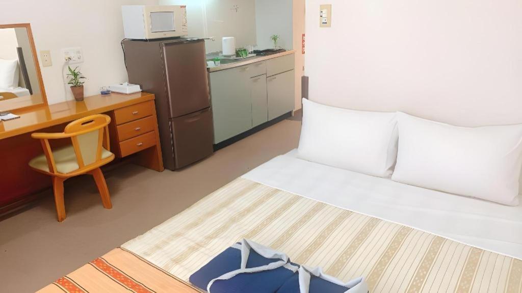 Hotel Peace Land Kume Naha Bagian luar foto