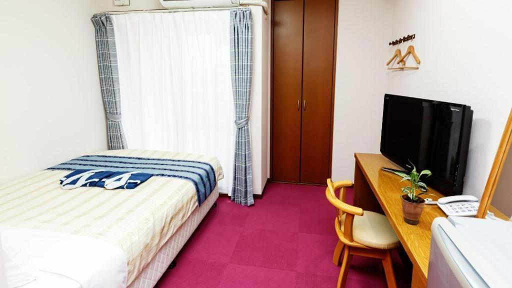 Hotel Peace Land Kume Naha Bagian luar foto