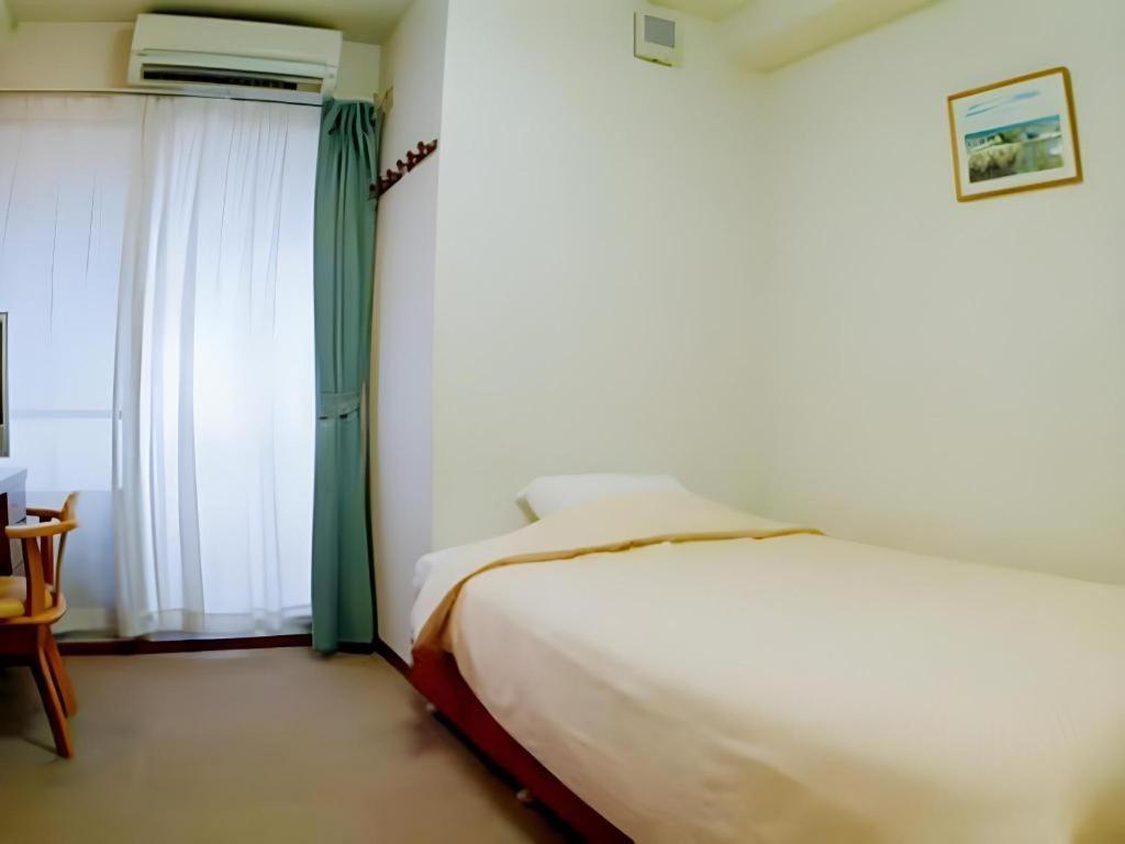 Hotel Peace Land Kume Naha Bagian luar foto