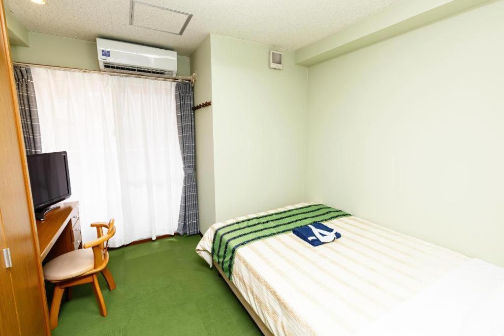 Hotel Peace Land Kume Naha Bagian luar foto