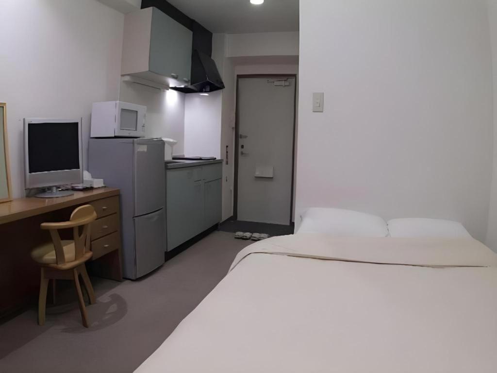 Hotel Peace Land Kume Naha Bagian luar foto