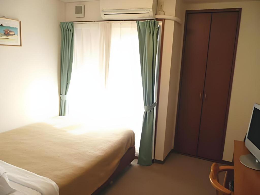 Hotel Peace Land Kume Naha Bagian luar foto