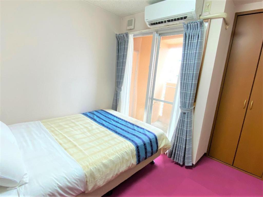 Hotel Peace Land Kume Naha Bagian luar foto