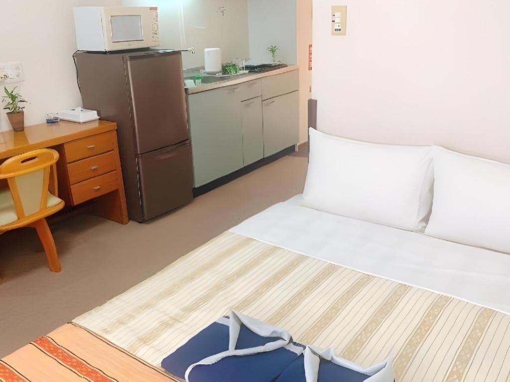 Hotel Peace Land Kume Naha Bagian luar foto
