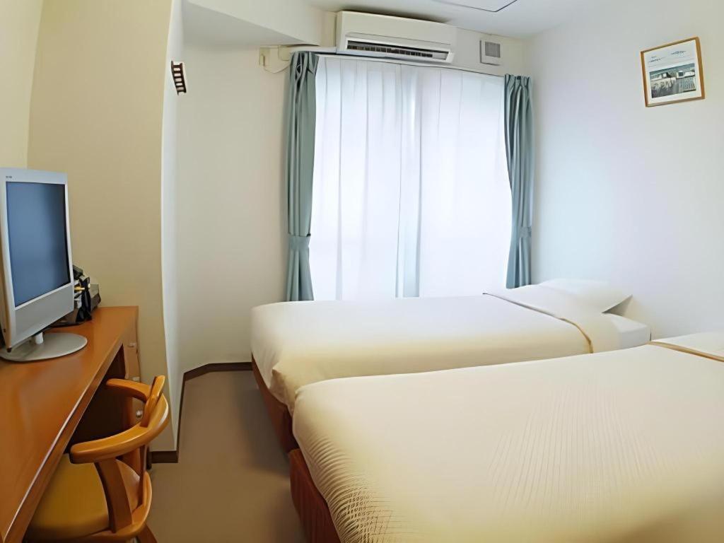 Hotel Peace Land Kume Naha Bagian luar foto