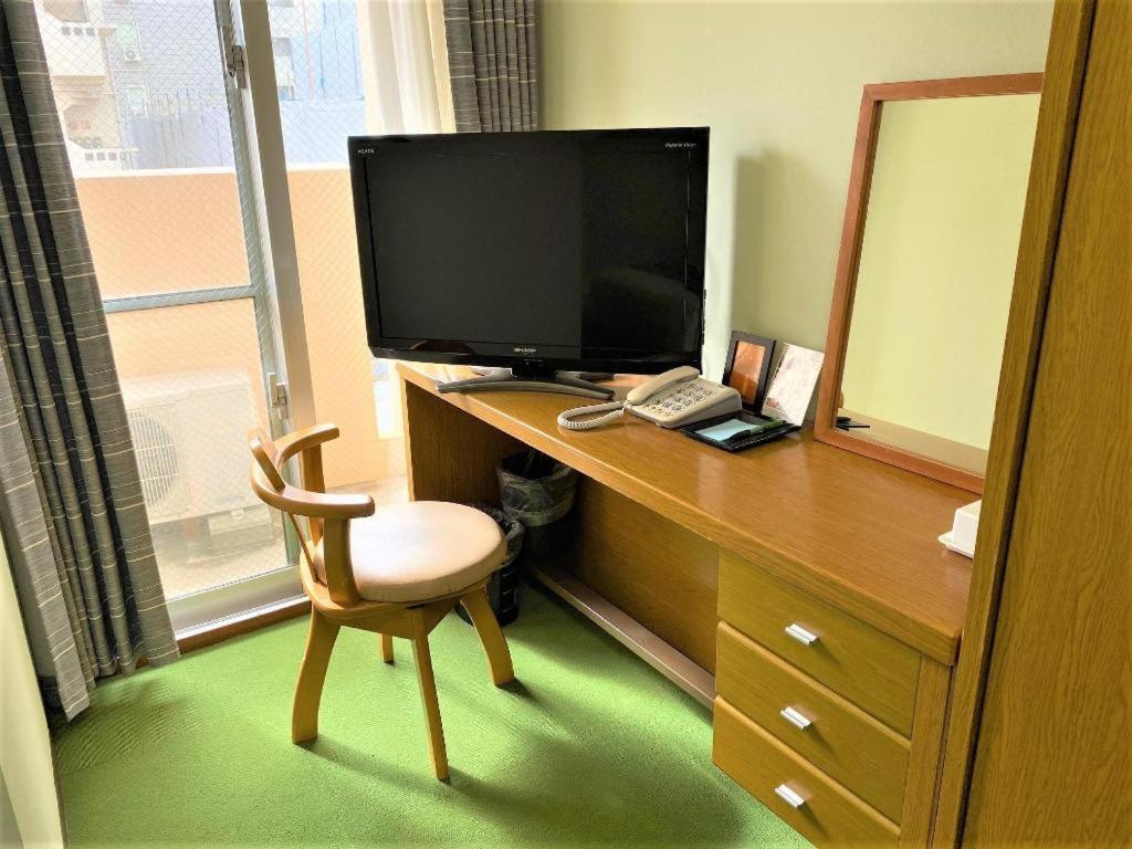 Hotel Peace Land Kume Naha Bagian luar foto