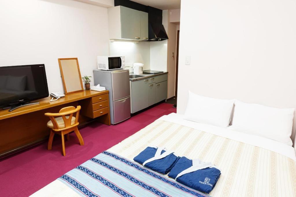 Hotel Peace Land Kume Naha Bagian luar foto