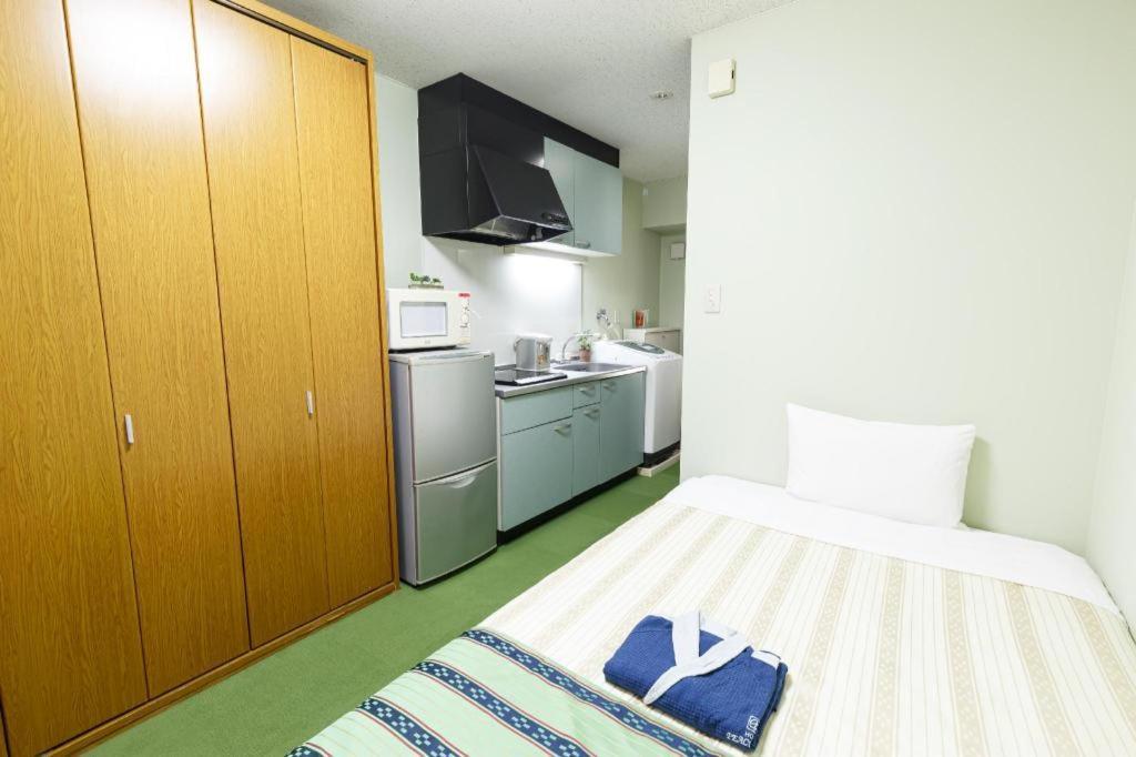 Hotel Peace Land Kume Naha Bagian luar foto
