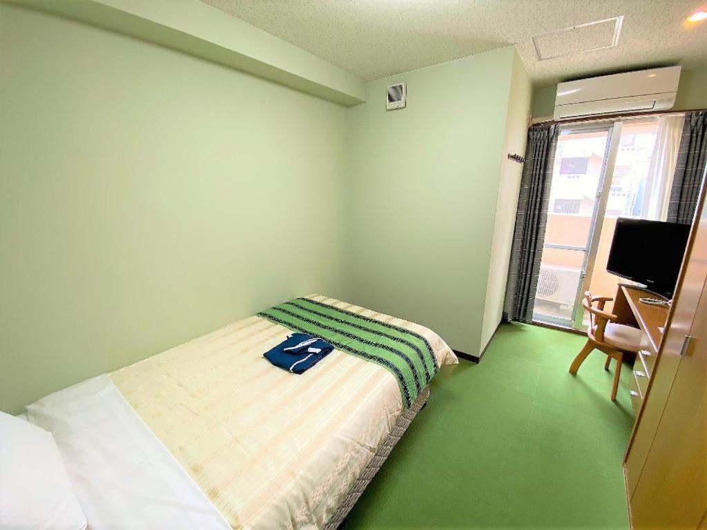 Hotel Peace Land Kume Naha Bagian luar foto